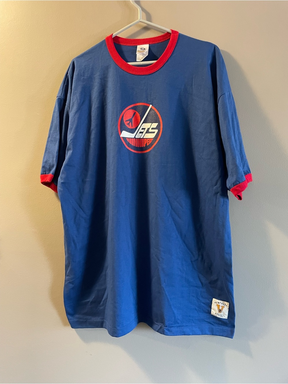 Winnipeg Jets Blue Ringer Tee with Red Trim by Starter